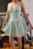 The dress looks very cute in the picture. However, it does not look as cute in person. The fit is very strange/weird. The midriff design is not good and I also needed to adjust the dress a lot to fit right in the bust area. Bought a size S and returned it. - Ashwini S.