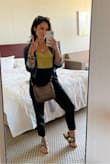 This is a great little top to add to your collection. It's pretty versatile. I'm in between an XS and a small and chose the XS. It fits perfectly. - Pilar H.