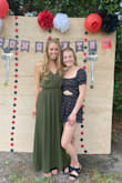Very happy with the dress. The color is beautiful & I love how it sits. - Delaney A.