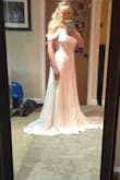 It looks so much better in person! I had already bought a dress from David's bridal but kept looking at this, ended up purchasing it and now I will be returning the David's bridal dress. This is perfect for my beach wedding! - Tanya J.