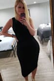 The material was stretchy, I can wear a medium or a small but definitely went with a medium because it's very form fitting. I loved it! Super flattering, got lots of compliments at my cousins wedding. - Angela S.