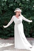 This was the absolute perfect dress for our small elopement that took place in both a desert and mountain climate. I felt so beautiful, the dress is well made, comfortable and easy to move in. For a larger busted woman, the top fit perfectly. Finding a bra was slightly channeling but was able to wear a white underwire bra and pin it so it wouldn't show in the back. I ordered both a M and L and while both fit, the large was slightly more comfortable in the sleeves. Also for shorter women, the length might be too long (I had to get it hemmed). Overall for the price, quality, fit and beautiful details, I am so so happy I chose this dress! - Amanda M.
