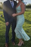 Perfect for a formal spring wedding! I ordered an XS which is my normal size and it fit great. - Ashley H.