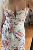 It's so cute! Sadly just not the right fit for my chest area imo as it was pressed against my larger chest and not covering well. Fit perfect in the waist and drapes nicely for the lower half. Would love to try a large if it restocks. - Maddie S.