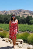 I'm obsessed! Beautiful print and the material is soft and amazing! Also, I love that it holds my chest in nicely and I don't feel overexposed! Great slit makes it a little sexy! Wearing to Napa this Summer and expecting it to be perfect! - Kelly W.
