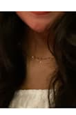 It's nice and simple which goes with most outfits but the 'longest' chain isn't really much longer than the other one so it twists easily and ends up looking like one chain instead of two. - Paola M.