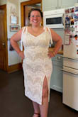 I bought this dress for my bridal shower, and it was perfect! Was surprisingly a good length, considering I am short! Not too sexy but a little with the high slit (be careful when you sit down!). The material has a nice stretch, I could have probably worn a L, but I didn't want it to be skin tight, the XL showed off my curves but wasn't too tight. I did have to wear a low backed bra, but the straps are thick enough to cover even thick bra straps. Received many compliments! - Sonja H.