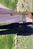 Dress looks exactly like picture. I'm 5'4 & a half and had 3in heels. I still had to get the dress hemmed by 3-4inches. The bust area is too big for me but wearable without alterations just not flattering but easily covered with a jacket. However if you need the dress tighter in the chest area the pretty back detailing will not look the same since you have to pull on the string tight to tie it.
The tight part of the dress luckily sits higher on the stomach area so I had no problem sitting or eating. - Alejandra M.