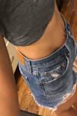 Between the pandemic and children, and my relentless search for a pair of shorts to cover my butt cheeks, (thanks 2019 for wanting to reveal a little too much)I think these will do. These are size 28. I'm showing stretch marks and all! There's some room to breathe. Size down if you don't want to breathe . The backside sufficiently covers both butt cheeks. Enjoy my Mamamarks. - Nickylyn D.