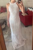 Loved this dress so much. I was just a little too short for it. The place I would need to hem was at the knee where it starts to flare out (which would be more expensive and difficult than it was worth for me). - Lauren T.