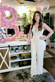 I absolutely LOVED this jumpsuit! I purchased it for my bridal shower and everyone raved about it! After reading the reviews I opted for an XS which fit me perfectly, and feels like a dream on. For something so elegant, it felt like I was wearing PJs which was absolutely amazing! The length was perfect with a pair of 2inch wedges. I haven't loved an outfit this much in a long time. It was worth every penny! - Sarah W.