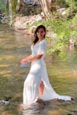 I bought this dress for a specific purpose, and it was perfect! I'm 5'5" and the length reaches the floor if you're barefoot. It has an elegant feel and look and absolutely love it! - Chedie R.
