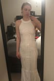 This dress is absolutely stunning, and looks 10x more expensive than it is. It fits perfectly, even with my small chest, so it's a great style for girls with a similar build.  I'll be wearing 2 inch heels with it, which will make it the perfect length, but you'll probably have to get it altered if you're shorter than my height of 5'9!  Hopefully they keep this one in stock for a while, it's the perfect wedding dress!

(It doesn't have any stretch tho, so if you're worried about sizing, you'll need to take that into account.) - Anna S.