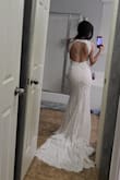 Ah this dress. Beautiful in the back. Comfortable. Could've been the one except that I did not love the front on the bust area, fit me a bit big too. - Yenny A.