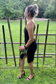 The dress is beautiful and sexy. I wore it to a wedding and got many compliments. The under skirt did keep moving up so I had to keep adjusting through out the day but other than that it was a beautiful dress. I bought a small. - Jennifer R.