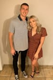 Super cute dress, I wish I got a medium because it is a little tight to wrap all the way around my hips. Wore this for my anniversary & looked super cute. - Emma S.