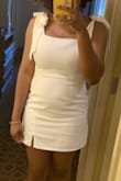 This dress was a perfect fit! I absolutely love the addition of the bow ties on the shoulder, and these ties also helped with adjustability. I am obsessed! - Tiia M.