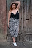 The skirt looks really nice when I'm standing up, indoors, not moving, but on a rainy windy day or even just sitting down the wrap is not enough material to keep me covered up to a comfortable level 7/10 - Emily W.