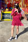 I usually wear a size small but I decided to order a size medium since I do have wide hips and shoulders. I am glad I did! It fits loose and a little long from the arms but I prefer it that way because it feels comfortable. I love that is dressy but you can easily make it casual too. I wore this for the opening of Avengers Campus for my Scarlet Witch bound! I received many compliments. - Helena L.