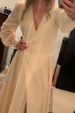 Love this dress! Adjustable waist line depending on tightness of ribbon. Not see through. Good material. - Emily H.