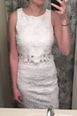 Ordered this dress for my Bridal Shower and it was perfect. The skirt for perfectly out of the bag (I'm a size 3 in Hollister jeans), but the top was a little loose. I had it taken in (very affordable) and that solved the problem & for around $100 total I don't think you can beat it! The fabric is of great quality too. (Mirror photo before alterations) - Julia B.