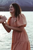 I love the color, the material and the style of this dress. It's different and cute and definitely "me". I chose to wear this dress for some of our engagement photos! They turned out so beautifully. - Yuki D.
