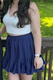Love this skirt. Normally in shorts/skirts I would pick a L but I saw some reviews saying this ran a bit bigger so I purchased a medium and it was perfect! My waist is much smaller than my hips so with the waistband not actually being adjustable a medium fit better in that sense too. A nice easy, casual skirt to throw on in summer. - Julie M.