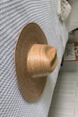 I will be honest, I was mildly horrified when I first saw the size of the box the hat shipped in. The box was small and the hat was so bent when I first pulled it out. It was a simple fix I just laid the hat on a flat surface and placed heavy objects on the brim. It's now perfect! So if you receive yours and it's bent don't panic it can easily be flattened out. Would definitely buy it again it's a beautiful hat just as pictured on the site! 
IG @Janine9492Ltk - Janine W.