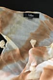 Beautiful scarf. Gave it only four stars because it has a large black tag that not only can you see it from the outside, if I tried to remove it would tear the delicate fabric. Should've used smaller white tag. - Debbie N.