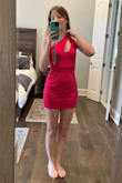 I wasn't very optimistic about this dress because I knew one-shoulder dresses don't typically fit me.  I have a very small chest, so a style like this dress is likely not going to fit. That turned out to be true. The only size available for me to order was an x-small. It was far too big on the top (as you can see me holding it up in the attached photos), but too tight in the body for it to be comfortable. The color is very vibrant, just as in the online picture. Bright color isn't something I normally go for, but I'm trying to change up my style. I was excited to add this to my closet, but it unfortunately didn't work out. I ended up keeping two other dresses that I had ordered. - Elyse D.