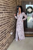 Beautiful dress, I bought a medium for a more tailored fit I am 5'8 and it was still a bit long, I wore a 2.5in heel. Overall a beautiful dress great shipping and customer service. - Natascha