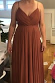I love this dress. It is well-made with a soft satin lining. The color is gorgeous and it fits like it was custom-made for me. It's a bit large in the chest, but I think either with a strapless bra (yuck) or some strategically placed pins it'll be ok. I am wearing it in my sisters wedding this November! - Allison H.