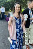 I can't express how much I love this dress. It's a true wrap dress so it fit perfectly and disguised my little tummy perfectly. I did have to pin the top to cover my bra but that's no big deal. I got sooo many compliments on it and I felt so confident in it. - Katy M.