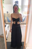 I didn't like that there was so much material in the pants, felt like they should have used 2/3 of the material and still kept the wide pant look. I also didn't like that the top was so wide in the back but I am pretty slim so maybe it's more flattering on someone a little bigger. I'm 5'5, 108lbs and usually between a small and xs but ordered this in an XS and wouldn't size up. - May L.