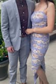 Love this dress!!! I got so many compliments. It's definitely a tight form fitting dress. The medium fit me, but the large was just a little more comfortable. - Lea C.
