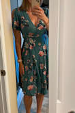 Pre-preg measurements 34DD, 26.5, 39.5, 142lb. Size small fit before I started to show and still does with a baby bump. Good coverage and hits just above the knee on me. I get compliments on it all the time, and just today had a lady yell out her car that I looked beautiful! - Alison P.