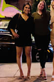 I wore double sided tape, as there was no clasp in the front, and it is very low cut. This fit well in a small, not too short or tight. It was flattering and I felt confident in it! - Valeria S.