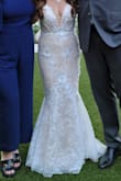 I wore this for my wedding reception and it was beautiful!! Looked like it costs so much more than what i purchaded it for, and it's very flattering making an hr glass shape to your body. Definitely worth eveey penny. I loved this dress. - Kris S.