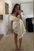 I loved this dress! The quality of the satin was beautiful. The only downside was the zipper getting stuck on the hand of the dress, I had to go to a tailor to get it fixed. - Julie K.