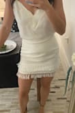 Fit well and matched it with an ivory top while I shopped for a wedding gown. Short and sassy but not too short. - Kelsey H.