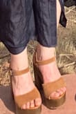 Just buy them! They are not quite the color in the photo which put me out just a teeny bit at first. Less red than in appears in the photo and a bit lighter brown. Still a beautiful wooden heel and pretty brown color, really made for a great boho/70s inspired wedding guest outfit. And I can see myself wearing them every chance I get. Super happy! - Erika M.