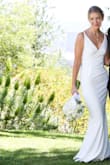 I always wanted an elegant wedding dress that fit beautifully, was classy and not overpowering.  I was so surprised to find my dress at Lulus.  This dress fit "off the rack" without alterations!  I received so many compliments - who would have known it was priced at less than $100!

Finding undergarments for this dress can be a challenge.  Regardless of your size, EVERY line will show through this dress.  I was able to go without a bra, although I would recommend a silicone skin bra (Can be found at Target).  Most importantly, after trying numerous undergarments, save yourself time and money and go with the Spanx High Power Capri Shaper.  These are footless and virtually seamless while smoothing everything.  (Purchased from Nordstrom which seems to carry a good amount in stock) - Jillian M.