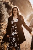 After MONTHS of searching and scheduling changes due to COVID, I saw this dress just 2 days before my engagement photos, and had it quickly shipped to me! The wind was howling and it was absolutely freezing but I was determined to wear this beautiful piece. As soon as I put it on, I knew it was "the one!" It's comfortable and beautiful at the same time. Very easy to dress up or down!  

The dress turned out to be everything I had been searching for and made for beautiful photos!! - Nicole E.