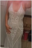 This dress was beautiful and the only reason I chose to return this is because I fell in love with a different Lulus dress (Alianna).  After reading reviews I ordered a size down and the dress fit perfectly (it's not zipped in my pictures purely out of my laziness)! Had I chose to keep this dress, no alterations would have been needed.  The fit was perfect, the beading was flawless, and the overall quality far surpassed the price of the dress.  The goddets created an alluring bottom to the dress and there was enough length that I could have worn small heels. - Amber W.