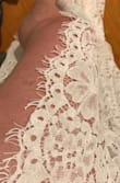 Love this dress. Sexy and classy. Lace isn't too see through. Runs a little large in the chest and length but will be getting altered before my wedding. Love love love the slit and eyelash lace. - Alesha W.
