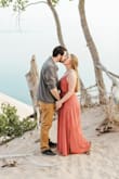 I absolutely loved this dress! It was purchased for our engagement photos and it was perfect. When I first tried it on it was WAY too long, but after the dress was washed and dried it shrunk to fit my height perfectly. The color was the same as shown, the only advice I would give is to make sure you wash it by itself; the slits up the side are very vulnerable to tearing! - Brianna O.