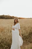 Obsessed with this dress, it was absolutely everything I wanted for our maternity shoot! I'm 130, size small pre pregnancy. At 37 weeks pregnant I'm 160 and the medium fit perfectly! Perfect amount of room for the belly while still fitting nicely everywhere else. All the dreamy boho vibes! - Kait D.