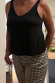 This is really comfortable. I said it runs large because I usually wear a Medium/8. This fits fine but it is on the short side. Super soft and comfortable. - Christina C.