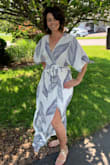 I completely love this dress! I feel so pretty and happy in this dress! It is soft and flowy, The slit is perfect, not to high and it shows your leg beautifully! I wish I could wear it everyday! - Julie N.