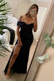 I bought this dress for a wedding anniversary and it is so flattering! It accentuates your curves and love the high leg slit! Fits perfectly!! - Cindy S.